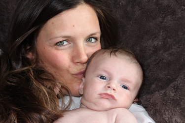 mom holding a baby